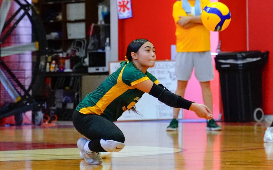 Keira Marrero tries to dig it out.