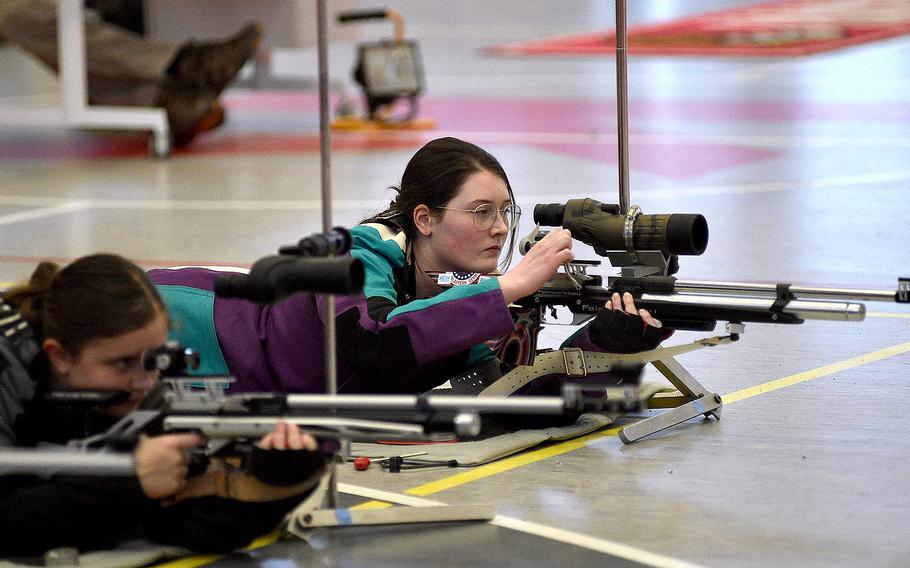 Kaiserslautern's Katelynn McEntee reloads after taking a shot during a marksmanship competition on Jan. 6, 2024, at Kaiserslautern High School in Kaiserslautern, Germany.