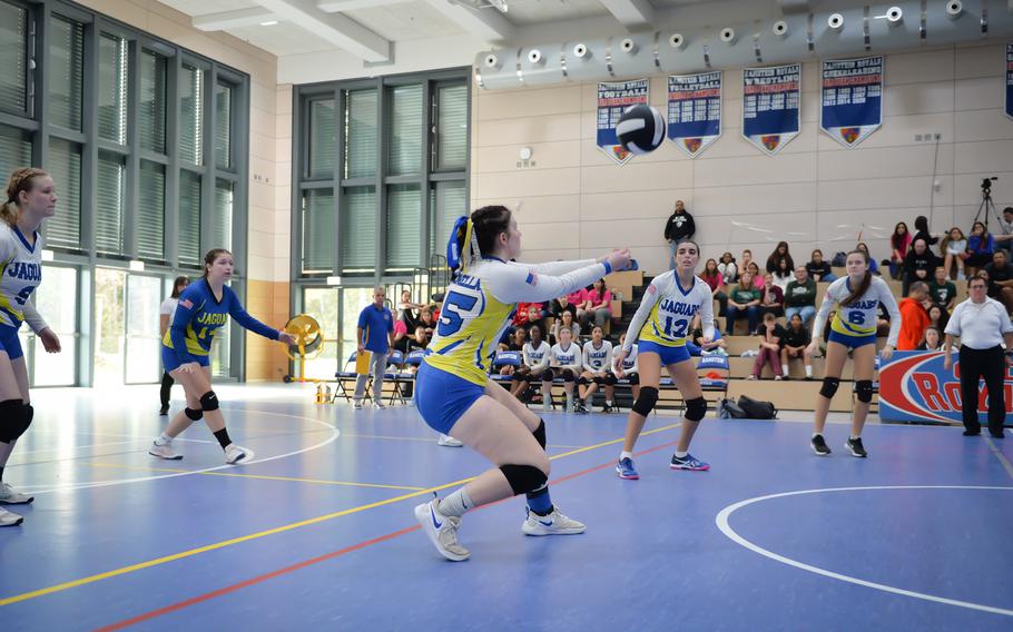 Laney Rearedon of the Sigonella Jaguars digs the ball over the net during the 2022 DODEA-Europe Volleyball Tournament Division III Championship game against Ansbach Oct. 29, 2022, at Ramstein Air Base, Germany.