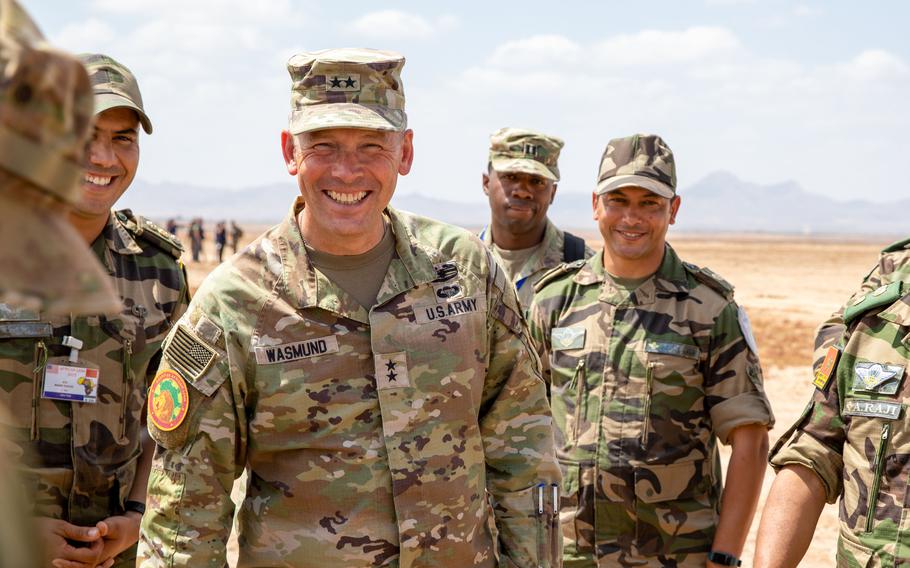 Army Maj. Gen. Todd Wasmund, commander of the Southern European Task Force, Africa, greets the leaders of airborne and medical units in Ben Guerir, Morocco, on June 10, 2023, during Exercise African Lion.