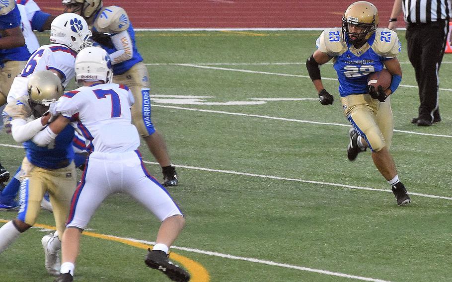 Wiesbaden running back Nick Cardona attempts to get around the Ramstein defense in a Sept. 17, 2021, game in Wiesbaden. It is a bye week in DODEA-Europe sports and most teams will be using the time to prepare for the last month of the season.