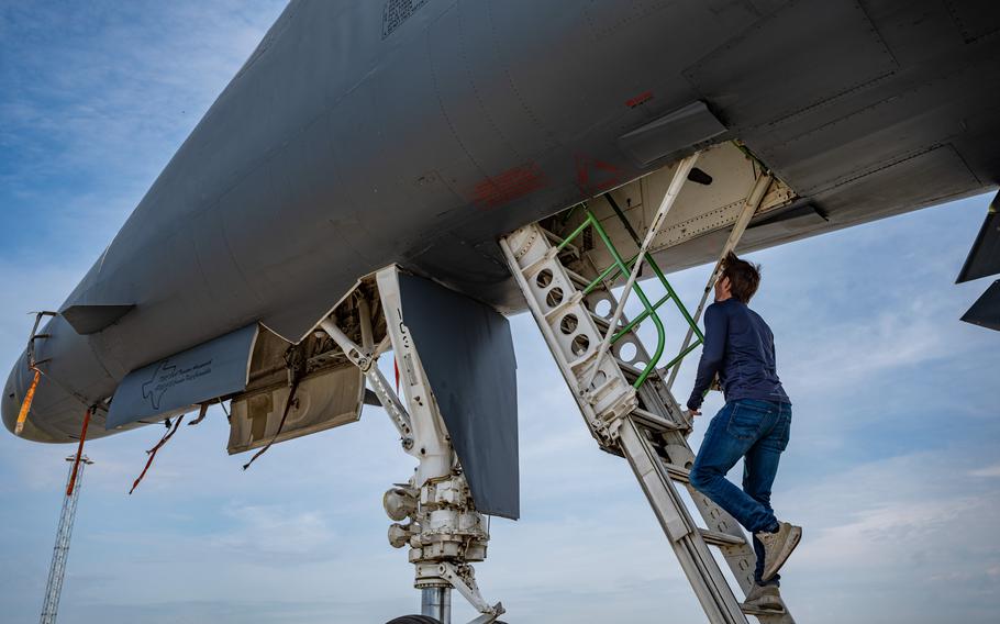 Joakim Vidgren, a Lulea Kallax Air Base public affairs specialist, climbs the ladder on a U.S. Air Force B-1B Lancer at the Swedish base, June 20, 2023. Two Lancers landed in Sweden for the first time.