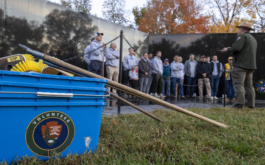 Volunteers wash Vietnam Veterans Memorial ahead of Veterans Day Stars