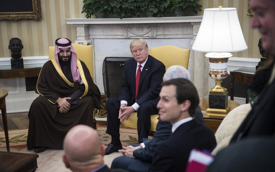 President Donald Trump meets with Mohammed bin Salman, then Saudi Arabia's deputy crown prince, in the White House in 2017 as White House senior adviser Jared Kushner, right, listens.