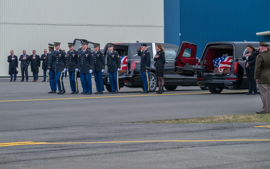 A New York Army National Guard Honor Guard team finishes placing the remains of Chief Warrant Officer Casey Frankoski into a hearse during planeside honors conducted at the Army Aviation Support Facility in Latham, N.Y., on Monday, March 18, 2024. 