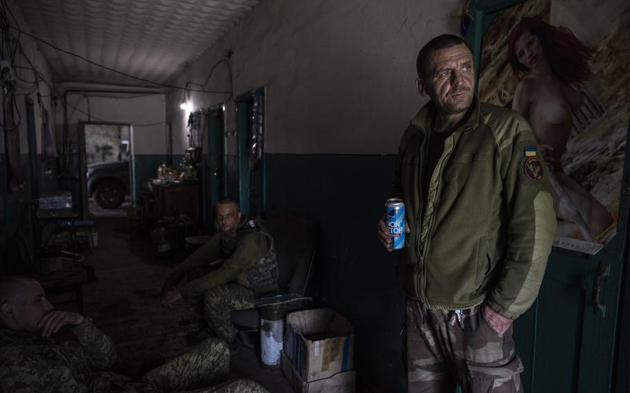 Soldiers from Ukraine's 24th Separate Assault Battalion at a logistics hub headquarters in Chasiv Yar in eastern Ukraine on May 26, 2023.. 