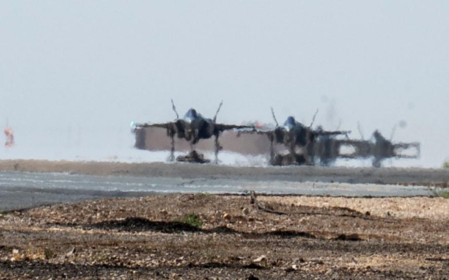 Air Force F-35A Lightning II fighter jets assigned to the 421st Expeditionary Fighter Squadron taxi on a runway in the U.S. Central Command area of responsibility July 25, 2023. The Pentagon sent a squadron of F-35s to the Middle East in response to recent Iranian attempts to threaten commercial shipping in the Strait of Hormuz.