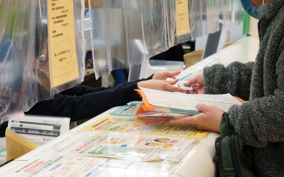 A patient visits Tokyo Metropolitan Hiroo Hospital in the city's Shibuya district, Feb. 21, 2023. 