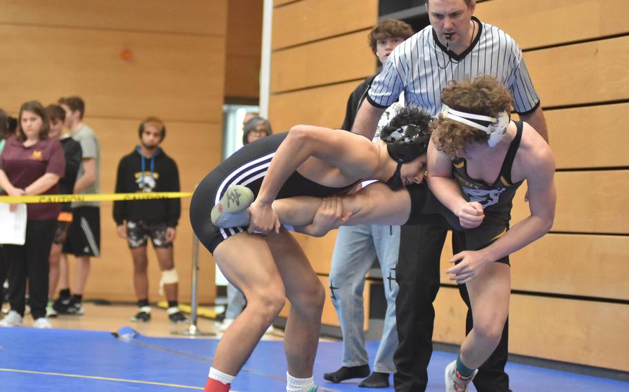 Vilseck’s Jayden Freeman won’t let Vicenza’s Paul Sturtevant get away in a 144-pound match Friday, Feb. 9, 2024, at the DODEA European Wrestling Championships in Wiesbaden, Germany.