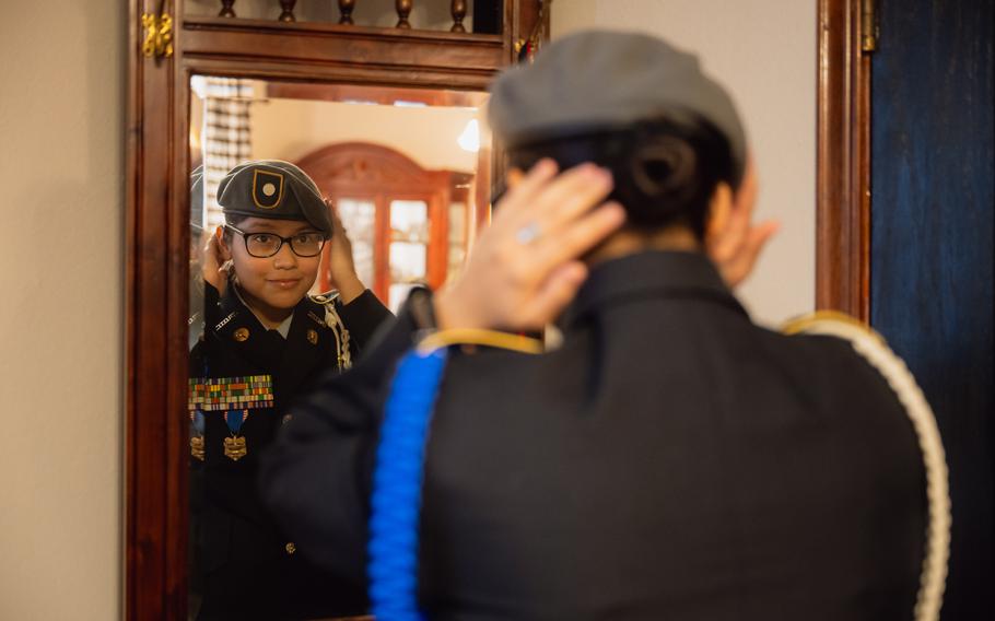 Joseline Leyva, a high school senior and member of the JROTC program at Tyler High School, adjusts her beret at her home before attending her school’s football game.