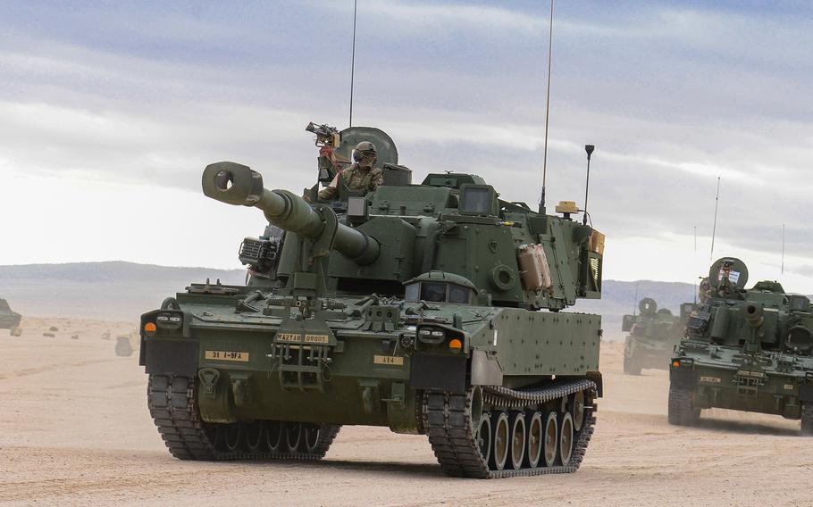 Soldiers with the Army’s 1st Battalion, 9th Field Artillery Regiment of the 3rd Infantry Division’s 2nd Armored Brigade Combat Team convoy their M109A7 Paladin howitzers across the National Training Center at Fort Irwin, Calif., during a training exercise Feb. 26, 2023. The M109A7 is the Army’s newest howitzer, and 2nd ABCT will deploy them to Europe late this summer.