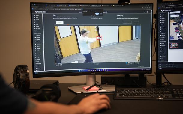 ZeroEyes analyst Mario Hernandez demonstrates the use of artificial intelligence with surveillance cameras to identify visible guns at the company's operations center, Friday, May 10, 2024, in Conshohocken, Pa.