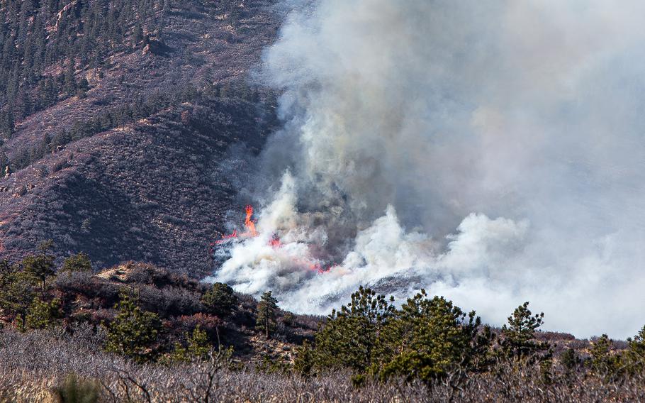 The West Monument Creek wildfire burns at the U.S. Air Force Academy on Sunday, Feb. 25, 2024.