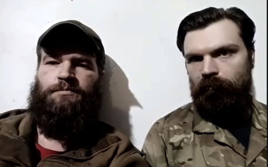 Svyatoslav Palamar, deputy commander of the Azov Regiment (left), and Azov lieuenant Illia Samoilenko hold a news conference over Zoom from the Azovstal steel plant in Mariupol. 