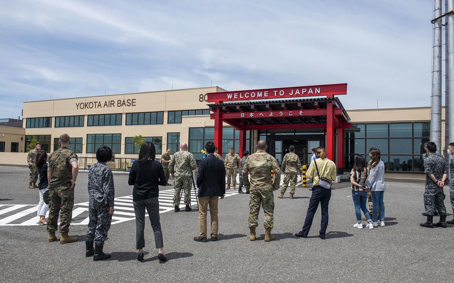 People attend the opening ceremony for the renovated Yokota Passenger Terminal at Yokota Air Base, Japan, June 13, 2022. 