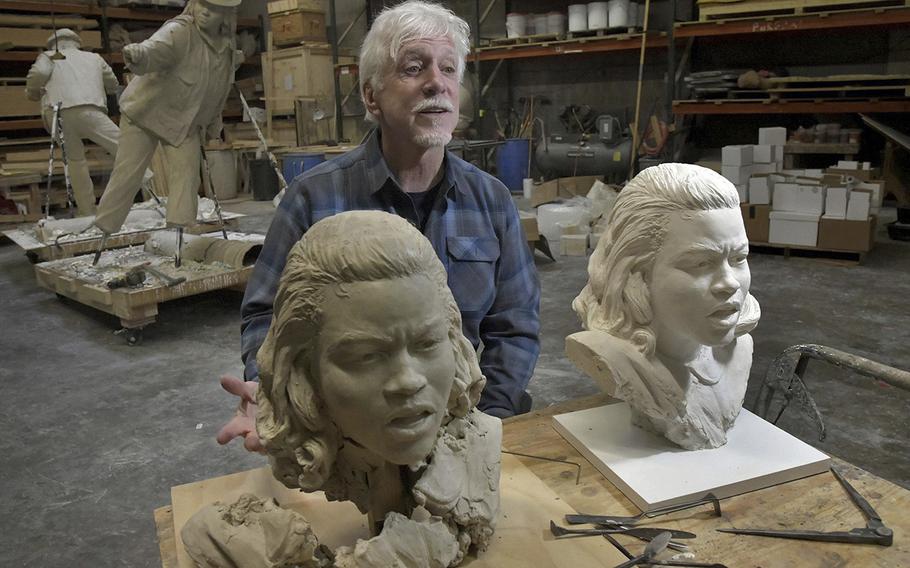 Sculptor Steven Weitzman in his Brentwood, Maryland studio with two versions of the head of civil rights activist Barbara Rose Johns, which will eventually be made into a full figure, cast in bronze. 
