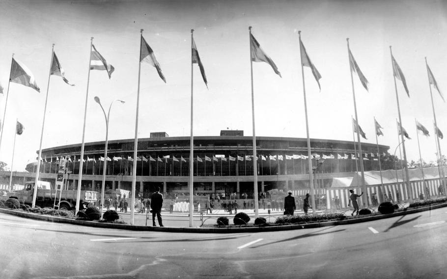 Emperor Hirohito led 72,000 people packed into National Stadium in cheering 7,000 young athletes as they marched into the arena for the Tokyo Olympics' opening ceremony  on Oct. 10, 1964. 