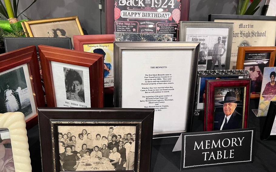A memory table features various keepsakes during World War II veteran Glendell Bennett’s 100th birthday celebration on Saturday, March 2, 2024, at the Embassy Suites by Hilton Lexington Green, Lexington, Ky.