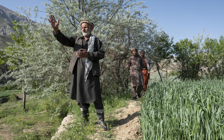 Mohammad Alim Faqiri, a farmer and former Mujahedeen fighter, points out the mountains in Panjshir province, Afghanistan, on April 27, 2021, where he said he once fought Soviet troops. 

Phillip Walter Wellman/Stars and Stripes