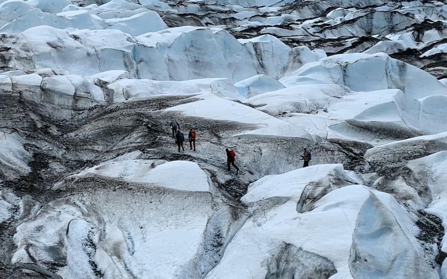 Recovery team members traverse Colony Glacier, Alaska, June 2019. The recovery team was searching for remains from a C-124 Globemaster II that crashed into Gannett Mountain, Alaska, on Nov. 22, 1952, while flying from McChord Air Force Base, Washington, to Elmendorf Air Force Base, Alaska, resulting in the loss of 52 service members. 