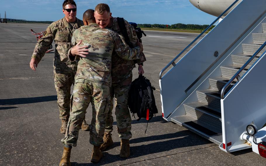 U.S. Air Force airmen assigned to the 823rd Rapid Engineer Deployable Heavy Operational Repair Squadron Engineer return home to Hurlburt Field, Fla., Sunday, April 14, 2024.