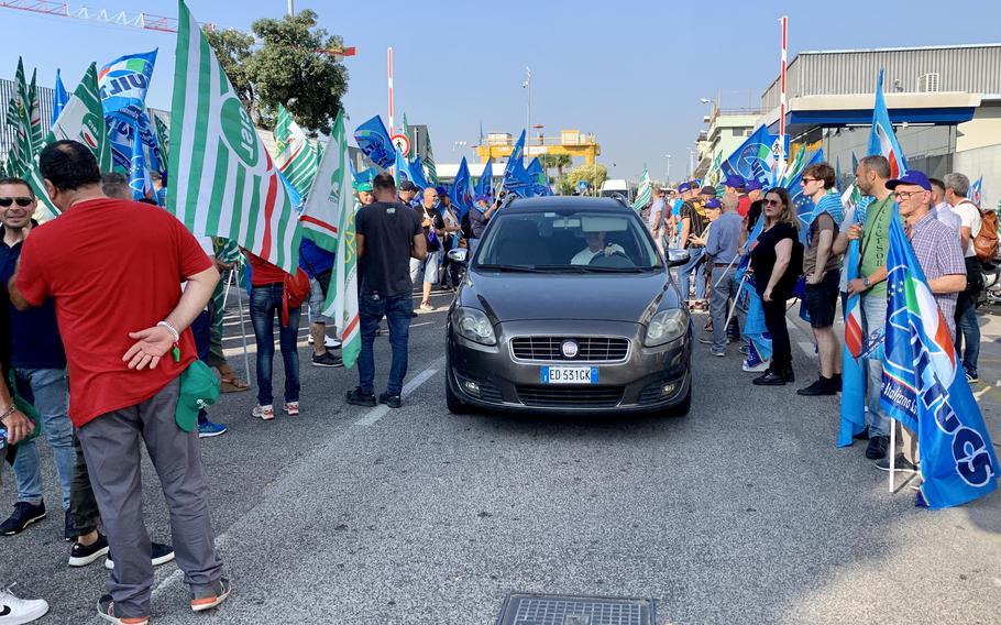 Italian base workers on strike June 30, 2023, outside Naval Support Activity Naples say their contract expired in October 2021. Negotiations on a new contract have stalled over pay increases, proposed layoffs and what unions representing 4,000 Italian base employees say are discriminatory practices.