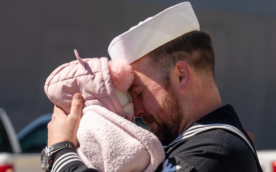 Machinist’s Mate 2nd Class Adam Huggins, assigned to the Wasp-class amphibious assault ship USS Bataan (LHD 5), part of the Bataan Amphibious Ready Group (ARG), greets his family as Bataan returns to Naval Station Norfolk following an eight-month deployment operating in the U.S. 5th and U.S. 6th Fleet areas of operation, Thursday, March 21, 2024.