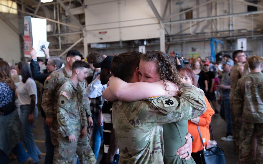 A member of Task Force Tomahawk reunites with family during a welcome home ceremony at Will Rogers Air National Guard Base in Oklahoma City, Feb. 22, 2024. 