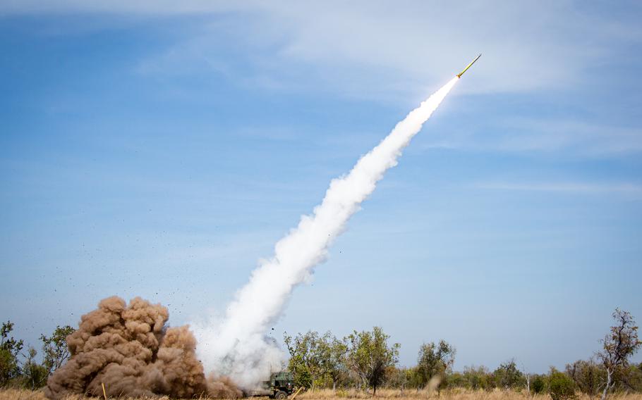 A Marine Corps M142 High Mobility Artillery Rocket System attached to Marine Rotational Force-Darwin fires a Guided Multiple Launch Rocket System while conducting an emergency fire mission during Exercise Koolendong at Bradshaw Field Training Area, NT, Australia, on Aug. 29, 2021.