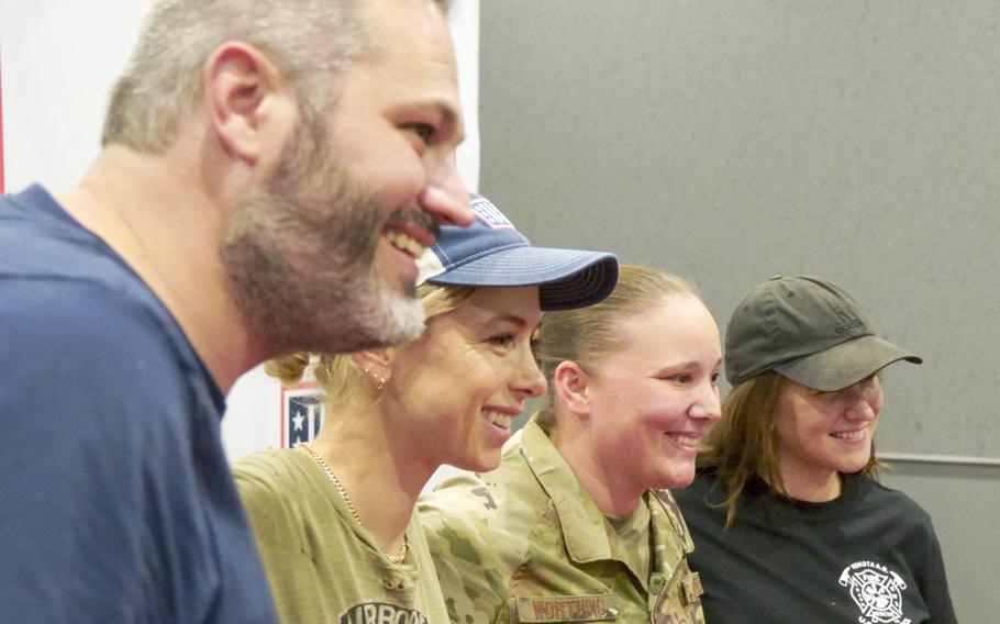 Air Force Tech. Sgt. Nichole Worthing poses with comedians Hunter Hill, far left; Iliza Shlesinger, second from left; and Laura Peek at the USO on Yokota Air Base, Japan, Thursday, July 20, 2023. 