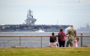 The aircraft carrier USS Ronald Reagan departs Yokosuka Naval Base, Japan, Friday, Sept. 29, 2023.