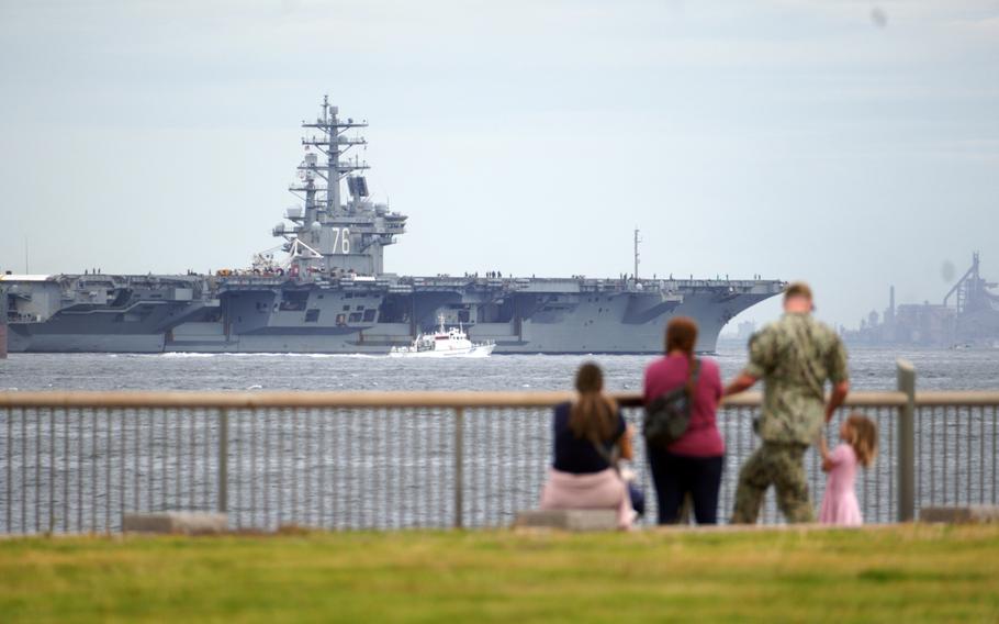The aircraft carrier USS Ronald Reagan departs Yokosuka Naval Base, Japan, Friday, Sept. 29, 2023.