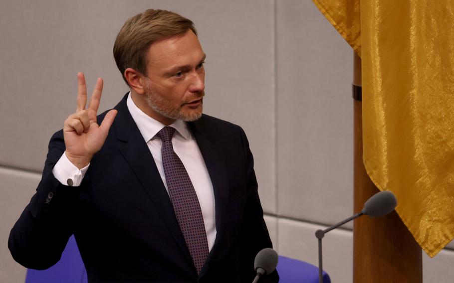 Christian Lindner, Germany's finance minister, swears an oath after being elected at the Bundestag in Berlin on Dec. 8, 2021. MUST CREDIT: Bloomberg photo by Liesa Johannssen-Koppitz.