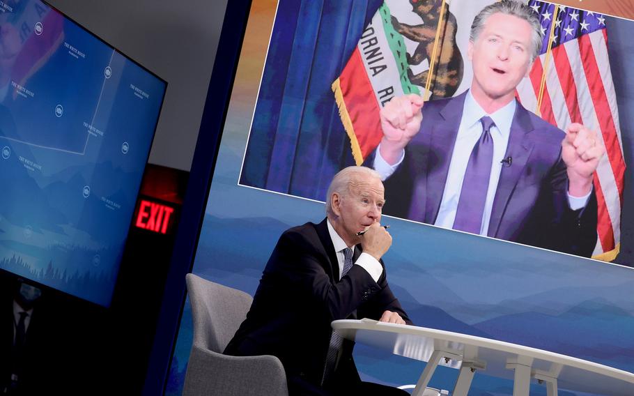 President Joe Biden listens during a virtual meeting with Vice President Kamala Harris and West Coast Governors in the South Court Auditorium in the Eisenhower Executive Office Building on Friday, July 30, 2021 in Washington, D.C.