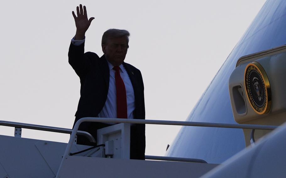 Donald Trump’s figure is seen next to Air Force One.