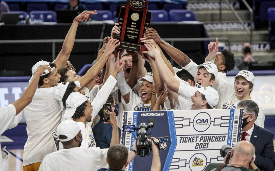 Drexel celebrates after beating Elon in the Colonial Athletic Association championship to secure an NCAA Trn