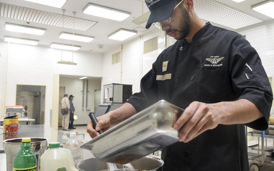 Senior Airman Ryan Scott prepares vegetable soup inside the Samurai Cafe Dining Facility at Yokota Air Base, Japn, March 14, 2024. 