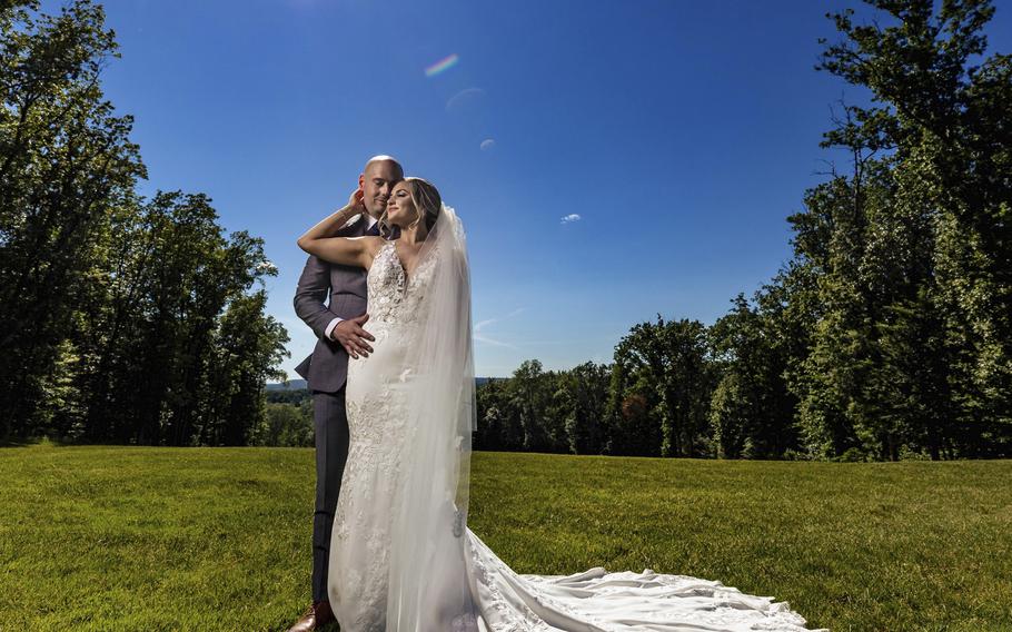 Stephanie and Trevor Harnen pose in Middletown, N.Y., on June 17, 2021. The two wed on a Thursday, tapping into a trend of couples choosing weekdays for their weddings, either by choice or necessity.