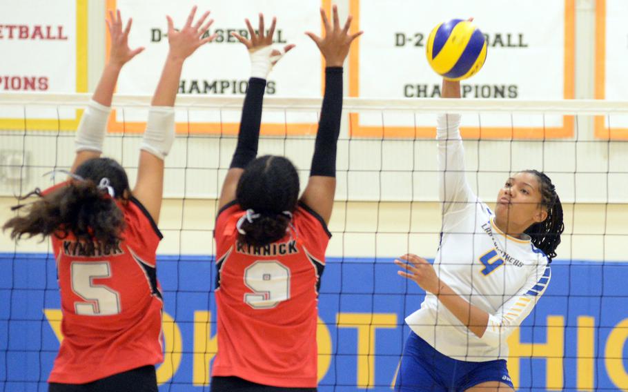 Ty’Lasia Anu hits the ball.