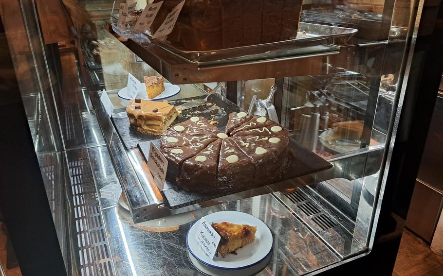 Items in the dessert case at Rada in Heidelberg, Germany, include brownies, cakes, tarts and the Latin American treat known as tres leches, meaning "three milks." 