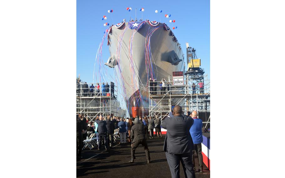 Military Sealift Command's newest fleet replenishment oiler USNS Robert F. Kennedy slides into the water following its christening at the General Dynamics NASSCO shipyard in San Diego, Calif., Oct. 28, 2023.