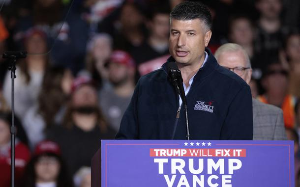 Tom Barrett, who is running for Michigan's 7th Congressional District speaks before former US President and Republican presidential candidate Donald Trump holds his final campaign rally before election day at Van Andel Arena in Grand Rapids, Michigan, on Nov. 4, 2024. (Jeff Kowalsky/AFP/Getty Images/TNS)
