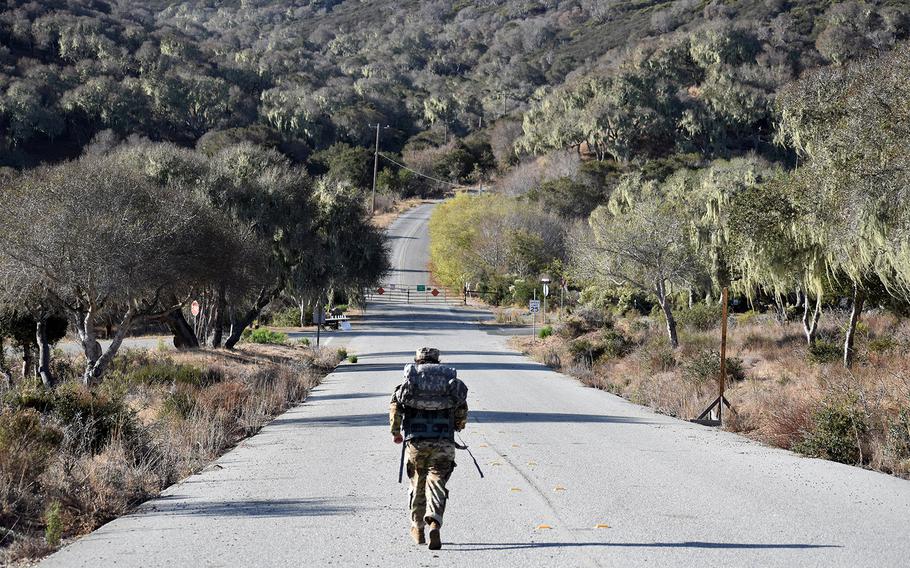A soldier participates in the Norwegian Foot March at Fort Ord National Monument, in Monterey County, Calif., Oct. 28, 2022. Mounting evidence shows that to kill pervasive poison oak and other weeds at Fort Ord — a former Army base, which closed in 1994 — the military sprayed and experimented with the powerful herbicide combination Agent Orange as far back as the 1950s.