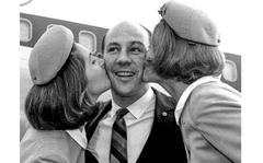 https://www.stripes.com/news/from-the-s-s-archives-safe-auto-racing-not-possible-says-stirling-moss-1.20424
Gus Vopolensky/Stars and Stripes
Frankfurt, West Germany, December, 1965: Auto-racing legend Stirling Moss gets kisses from a couple of flight attendants after arriving at the Frankfurt airport. Moss won 212 races of all kinds in his career, which began in 1948 and ended with a 1962 crash that left him in a coma for six months. Sixteen of his wins were in Formula One Grand Prix events.