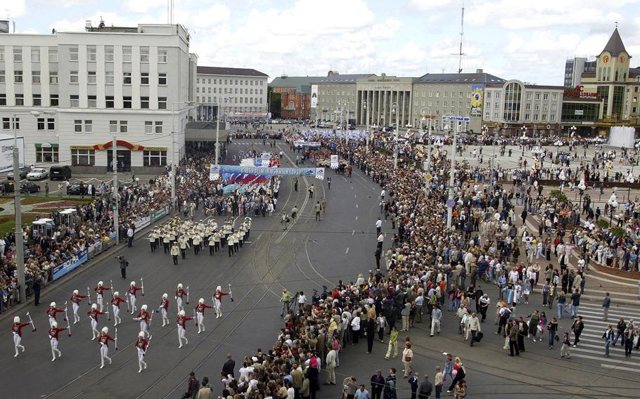 People gather to watch a festive parade marking the 750th anniversary of Kaliningrad, Russia’s westernmost city, on July 1, 2005. 