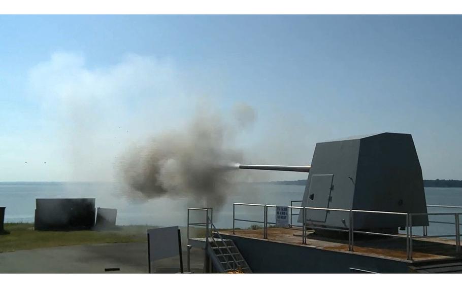 A video screen grab shows a gun weapons system firing on targets at the Naval Surface Warfare Center Dahlgren Division’s Potomac River Test Range on Aug. 30, 2016.