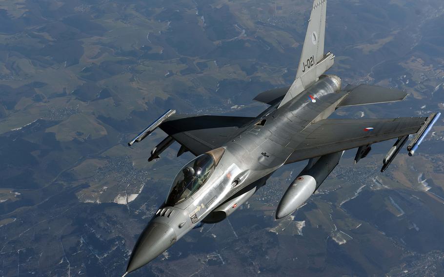 A Dutch air force F-16 pulls away from a U.S. Air Force KC-135 Stratotanker after refueling over Germany in 2018. The Netherlands is one of the countries spearheading a coalition to train Ukrainian pilots on the F-16.