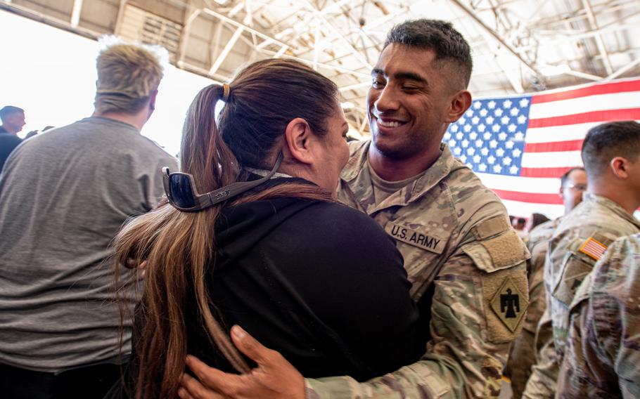 A member of Task Force Tomahawk reunites with family during a welcome home ceremony at Will Rogers Air National Guard Base in Oklahoma City, Feb. 23, 2024. 