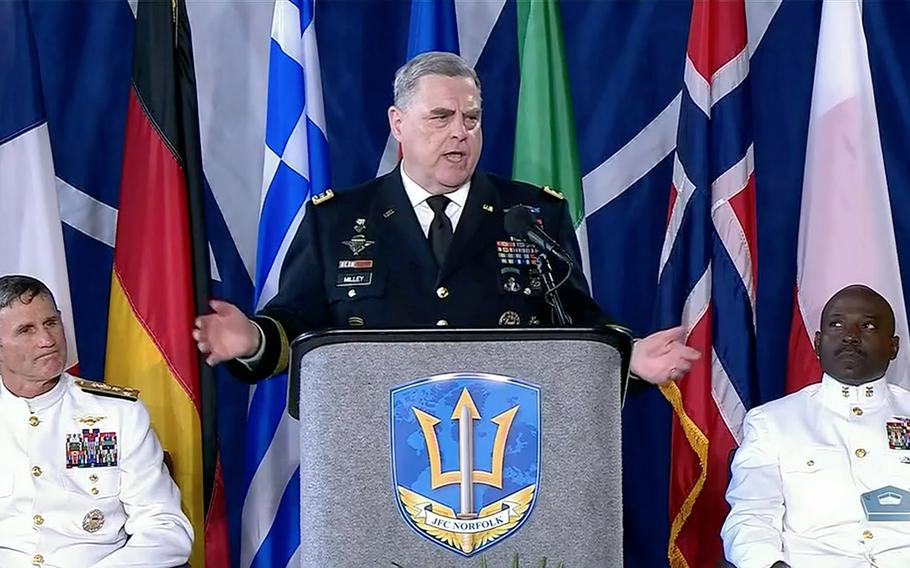 In a screenshot from a Defense Department live feed, Army Gen. Mark A. Milley, chairman of the Joint Chiefs of Staff, speaks aboard the USS Kearsarge during a ceremony marking NATO’s Joint Force Command Norfolk fully operational, July 15, 2021. At left is U.S. Navy Vice Adm. Andrew Lewis, the JFC Norfolk commander.