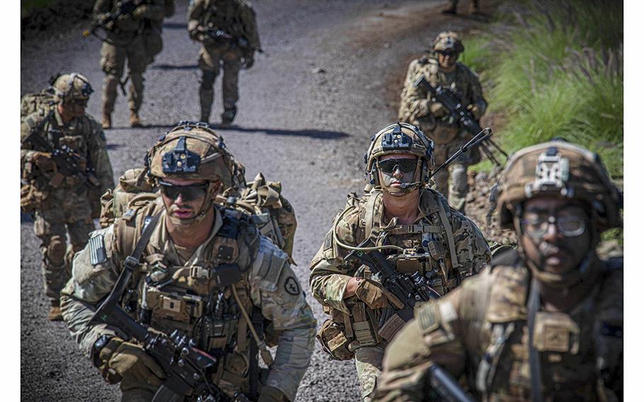 Soldiers from 1st Infantry Battalion, 21st Infantry Regiment and 2nd Battalion, 11th Field Artillery Regiment, 25th Infantry Division conduct convoy operations and field reconnaissance on Pohakuloa Training Grounds, on Oct. 31, 2022. 